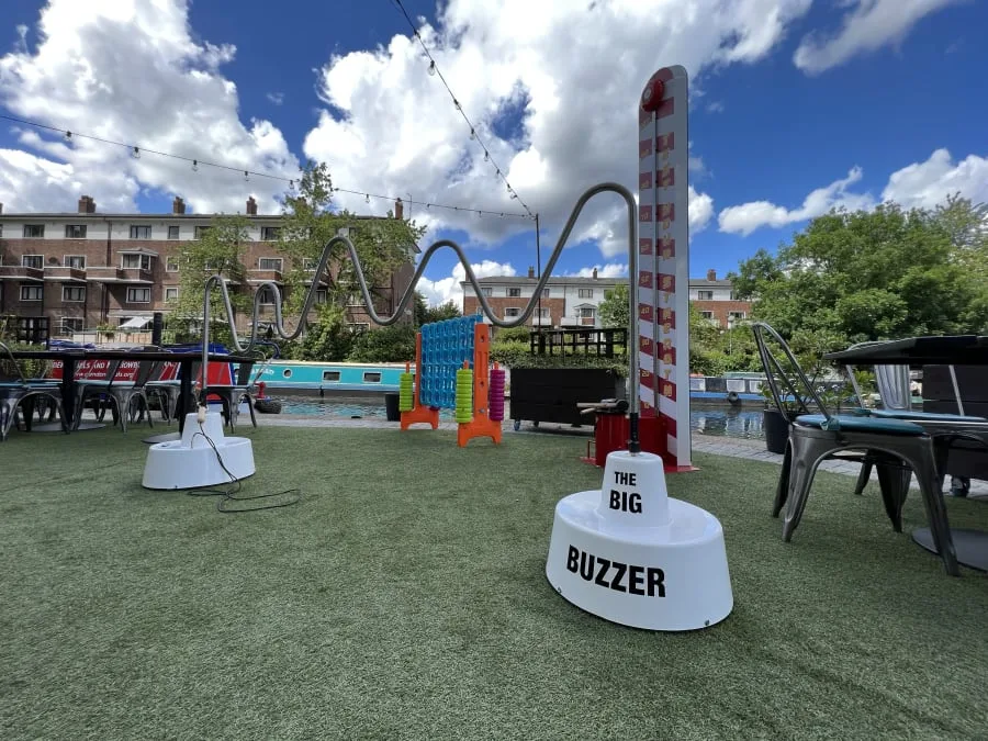 High striker and buzzer game set up together